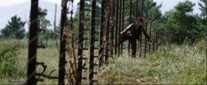 Katniss going through the fence